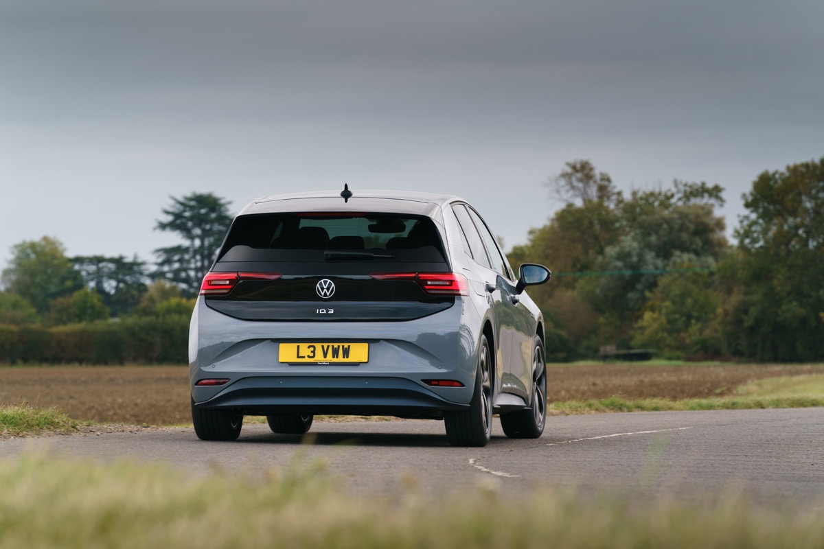 VW ID.3 exterior rear driving around corner